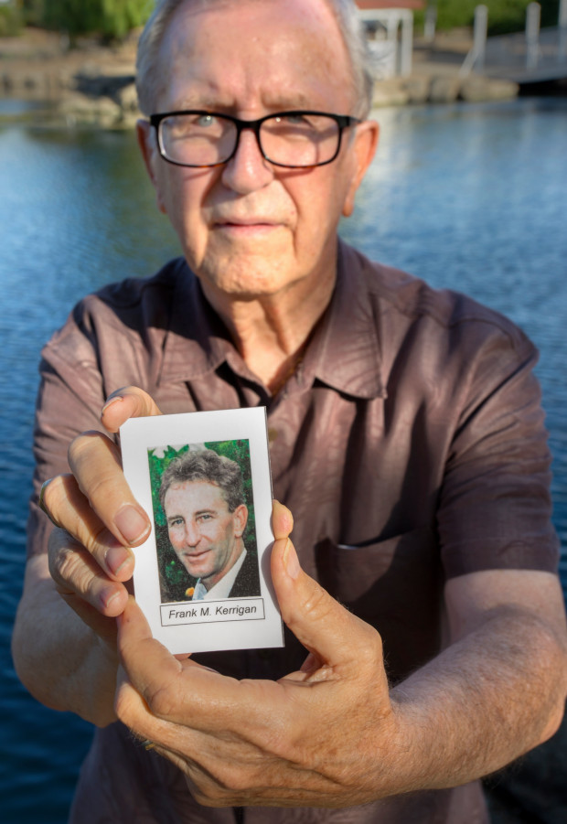 Frank Kerrigan holds onto a a funeral card for his son Frank. In May the Orange County Sheriff-Coroner’s Office claimed his son Frank had died and was buried.