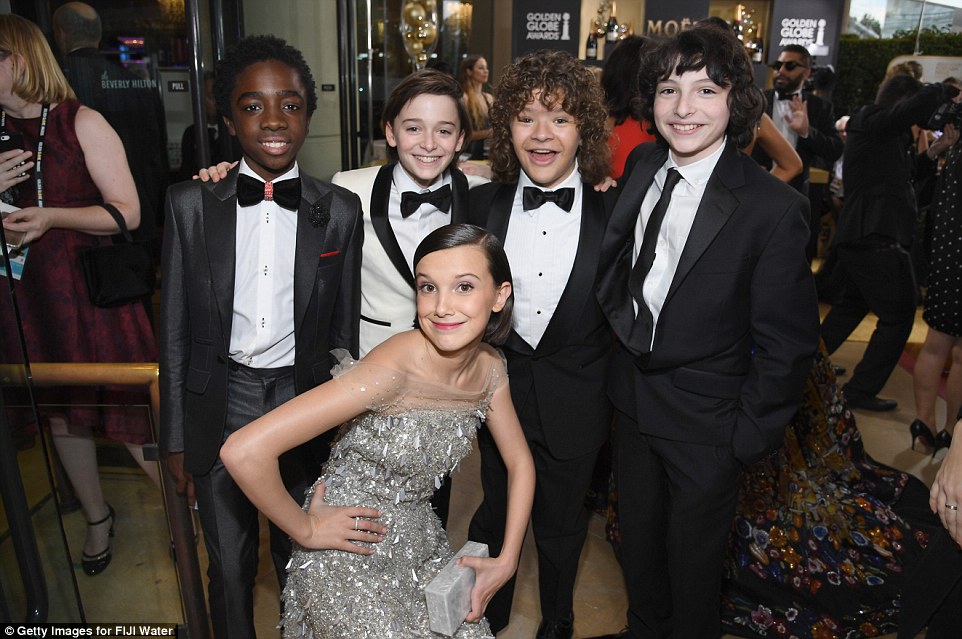 Hollywood's next generation: Stranger Things stars Caleb McLaughlin, Noah Schnapp, Gaten Matarazzo, Finn Wolfhard, and (bottom) Millie Bobby Brown enjoy their big night out